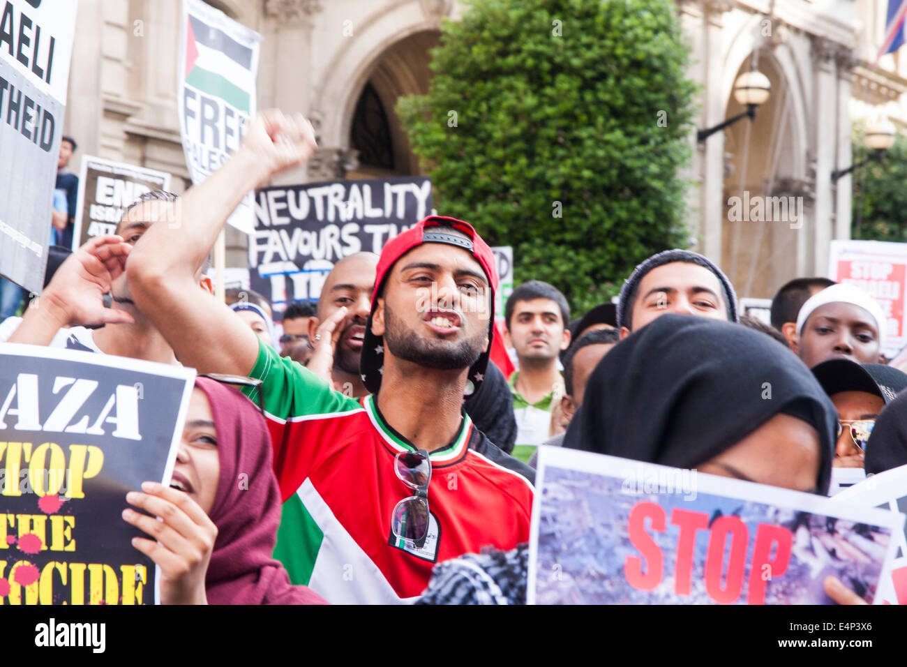 London, UK. 15th July, 2014. Palestinians and their supporters demonstrate outside the BBC's headquarters against an alleged pro-Israeli bias in their coverage of Palestinian affairs. Credit:  Paul Davey/Alamy Live News Stock Photo