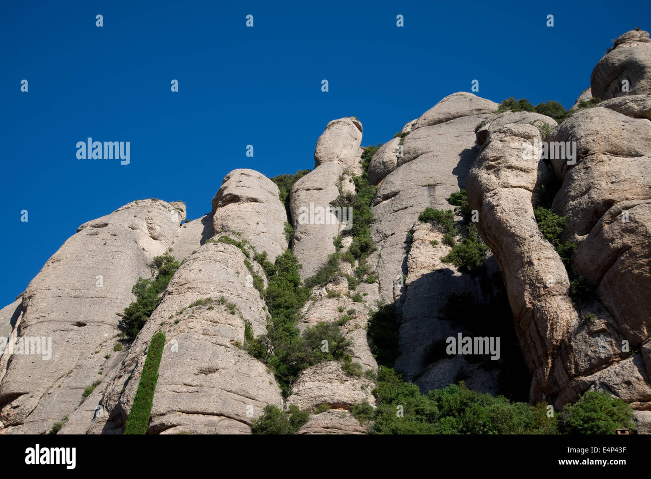 Montserrat is a multi-peaked mountain in Spain where is the Benedictine abbey with the black Madonna Stock Photo