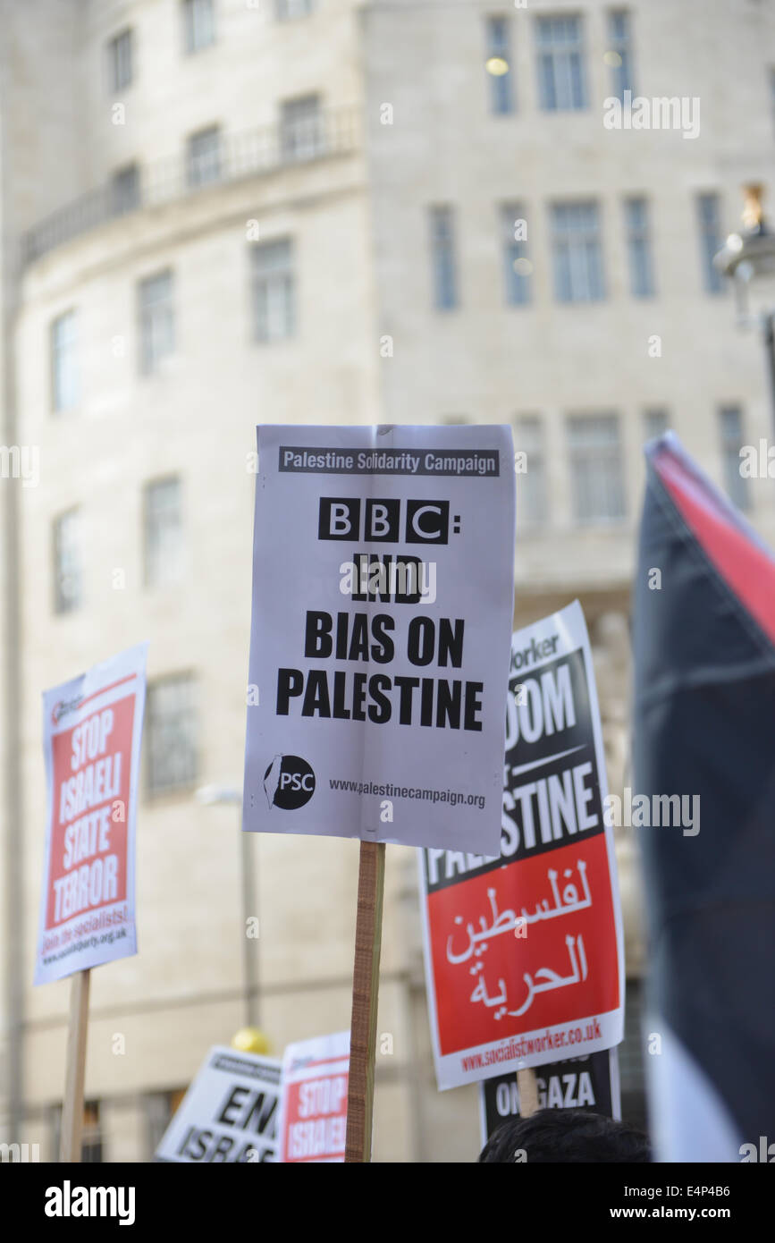 Langham Place, London, UK. 15th July 2014. Pro Palestinian supporters stage a mass protest outside the BBC headquarters in Langham Place, chanting slogans against both Israel and the BBC itself. Credit:  Matthew Chattle/Alamy Live News Stock Photo