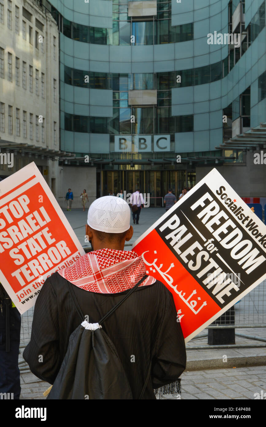 Langham Place, London, UK. 15th July 2014. Pro Palestinian supporters stage a mass protest outside the BBC headquarters in Langham Place, chanting slogans against both Israel and the BBC itself. Credit:  Matthew Chattle/Alamy Live News Stock Photo