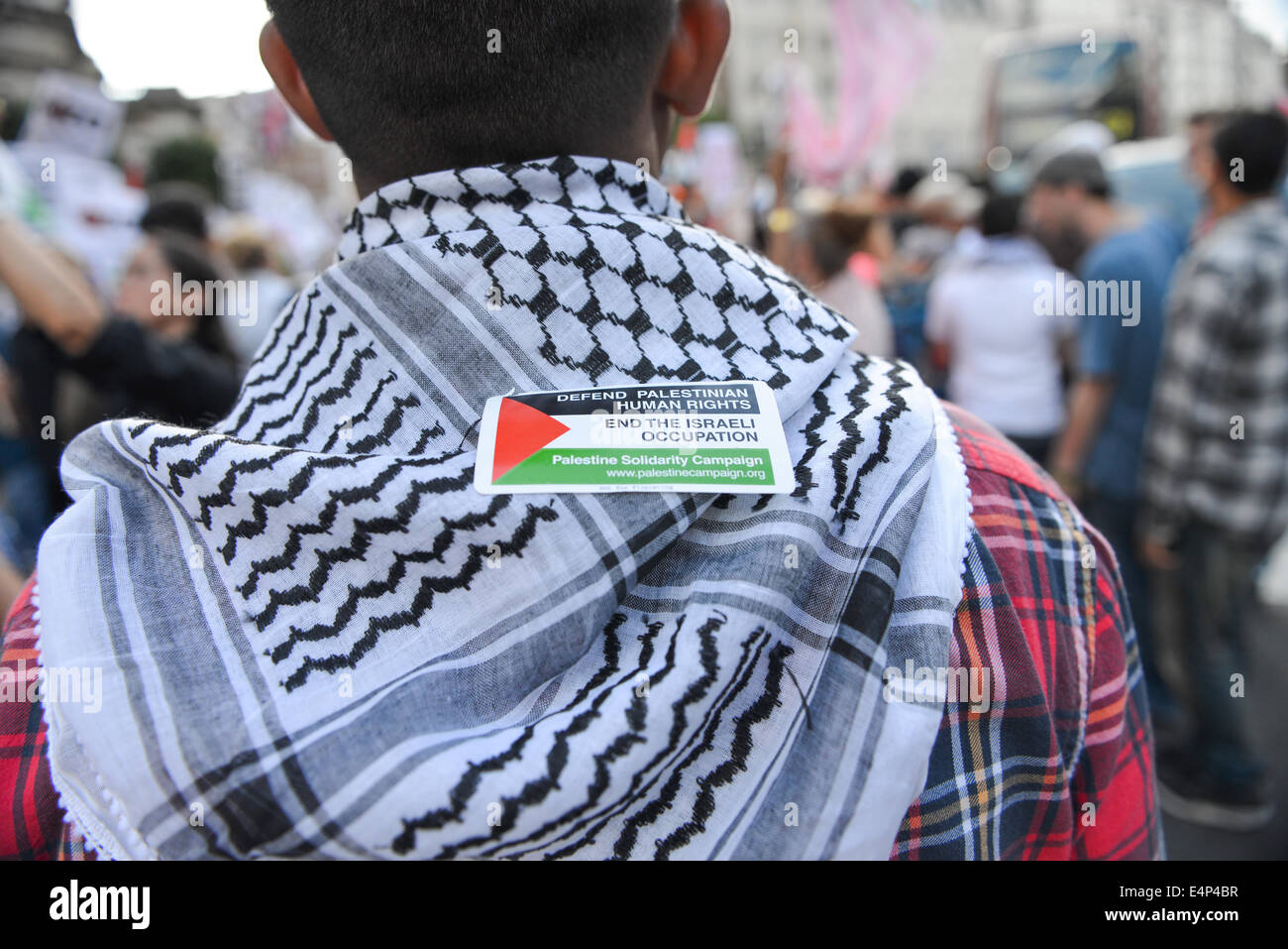 Langham Place, London, UK. 15th July 2014. Pro Palestinian supporters stage a mass protest outside the BBC headquarters in Langham Place, chanting slogans against both Israel and the BBC itself. Credit:  Matthew Chattle/Alamy Live News Stock Photo
