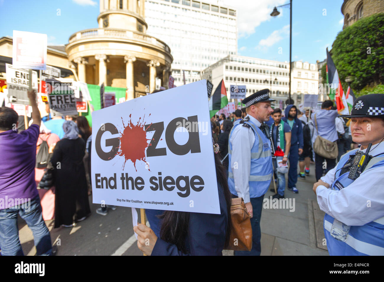 Langham Place, London, UK. 15th July 2014. Pro Palestinian supporters stage a mass protest outside the BBC headquarters in Langham Place, chanting slogans against both Israel and the BBC itself. Credit:  Matthew Chattle/Alamy Live News Stock Photo