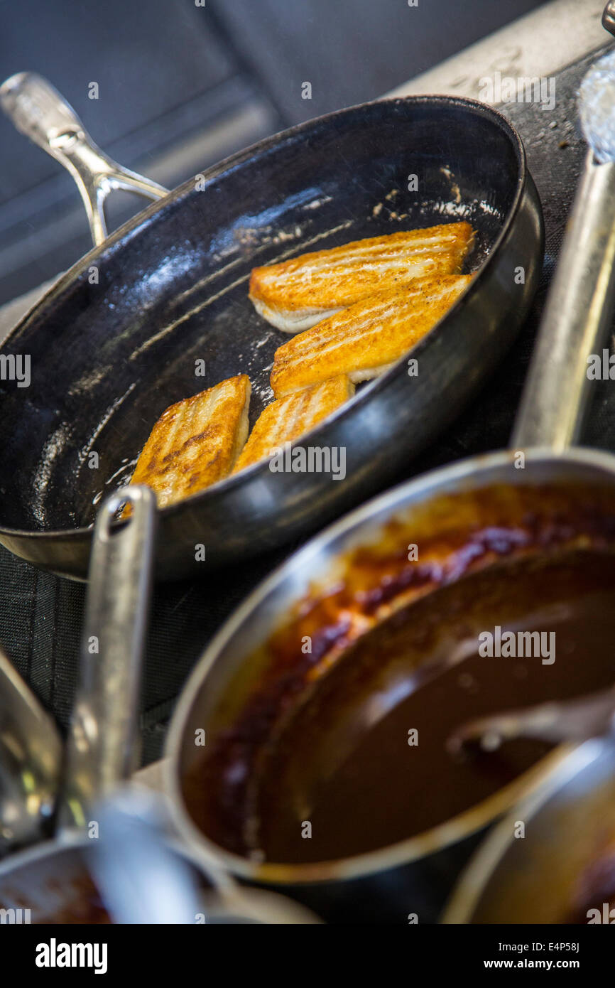 Large cooking pans hi-res stock photography and images - Alamy