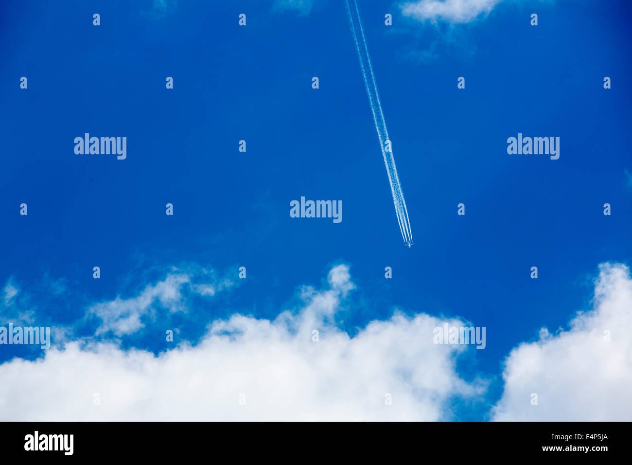 Four-engine jet aircraft in the sky Stock Photo