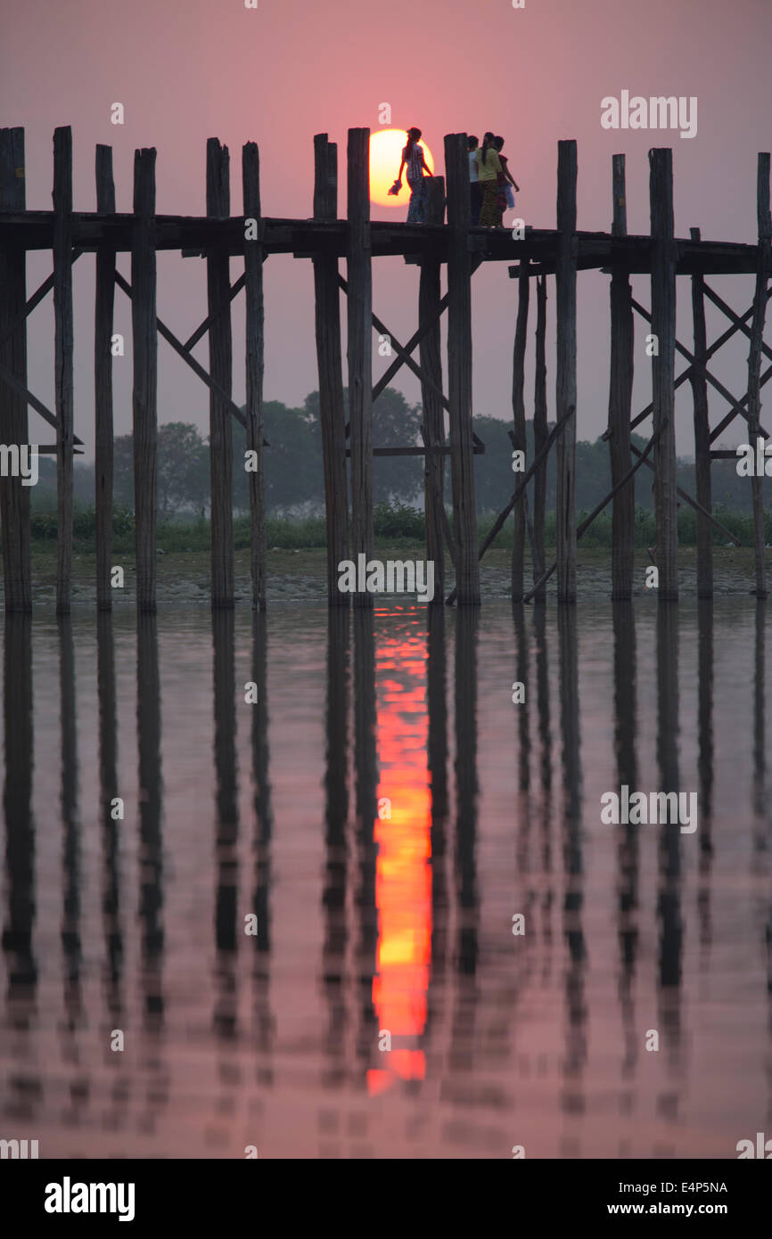 People crossing U Bein Bridge, Burma, at sunset Stock Photo - Alamy