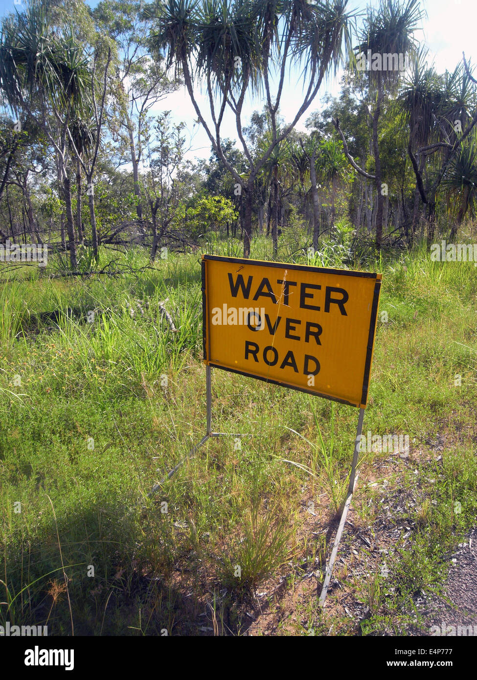 Kakadu in the wet season - sign warning of water covering road. Kakadu National Park, Northern Territory, Australia Stock Photo