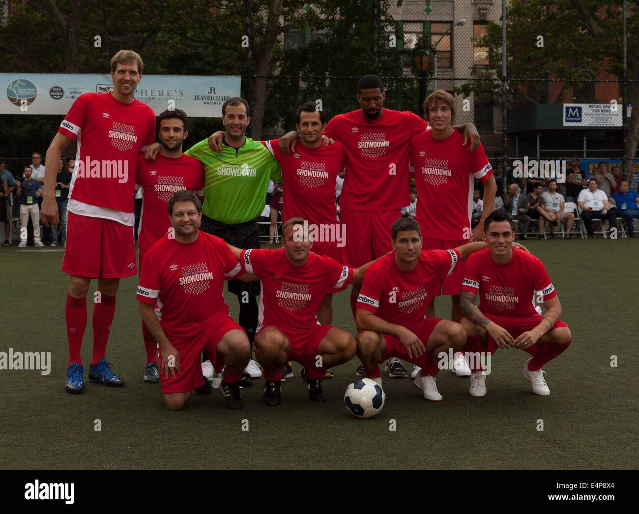 NEW YORK, NY - JUNE 25, 2014: Red Team (2nd row) Dirk Nowitzki, Giuseppe Rossi, goalkipper, Hasan Salihamidzic, Wilson Chandler, Stock Photo
