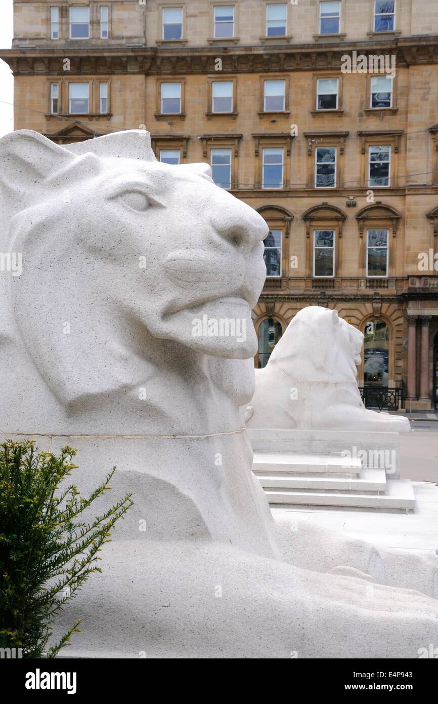 Stone lion statue outside the city chambers in Glasgow's Square