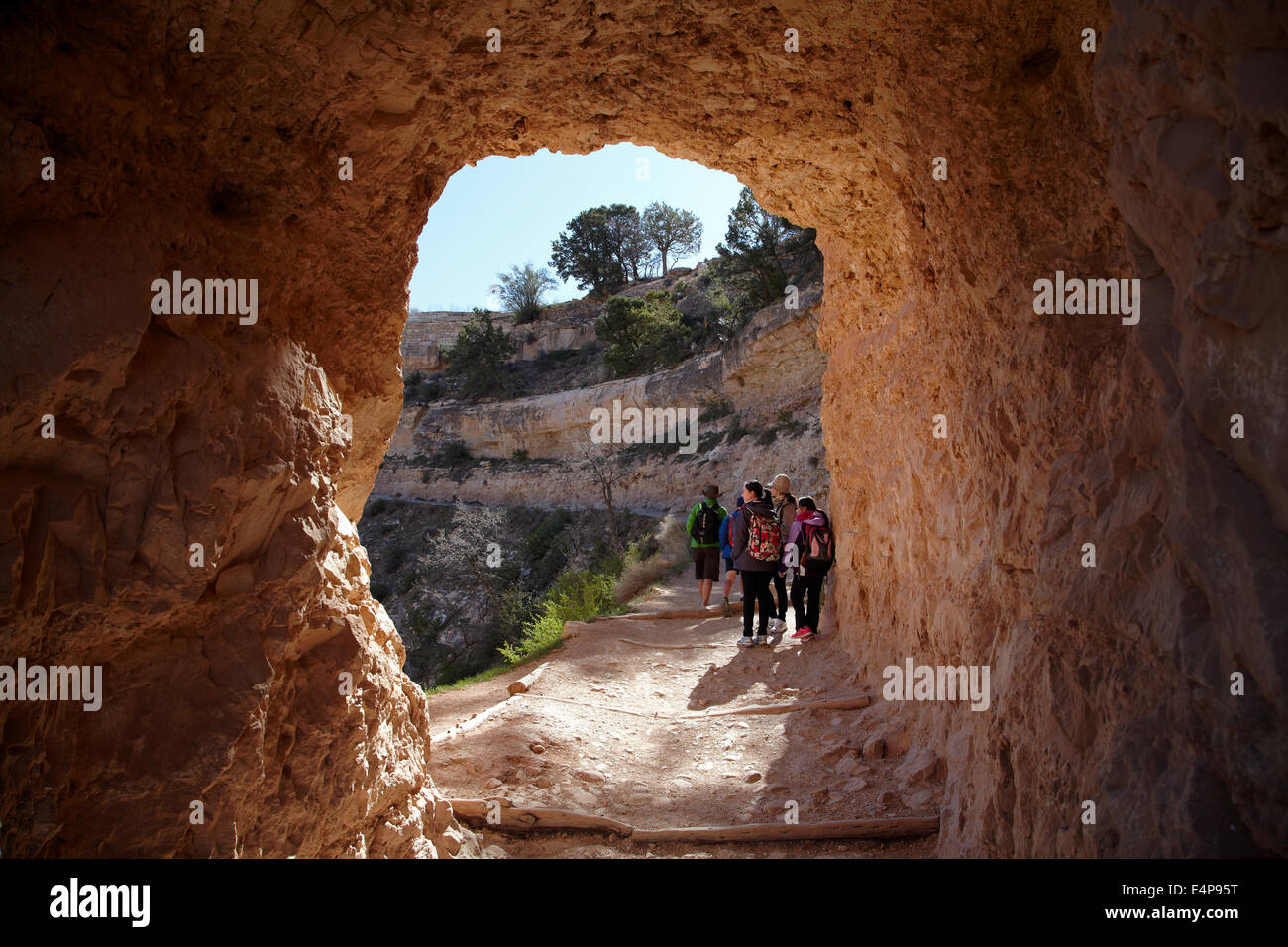 People hiking through tunnel on Bright Angel Trail, South Rim, Grand Canyon, Grand Canyon National Park, Arizona, USA Stock Photo