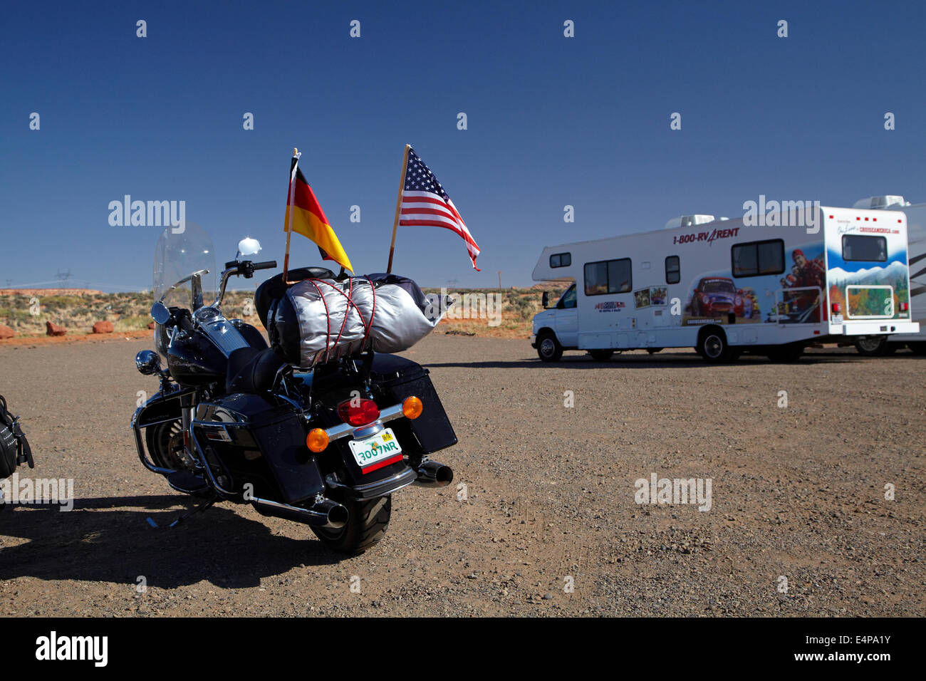 Motorcycle and RV in carpark for Colorado River at Horseshoe Bend, near