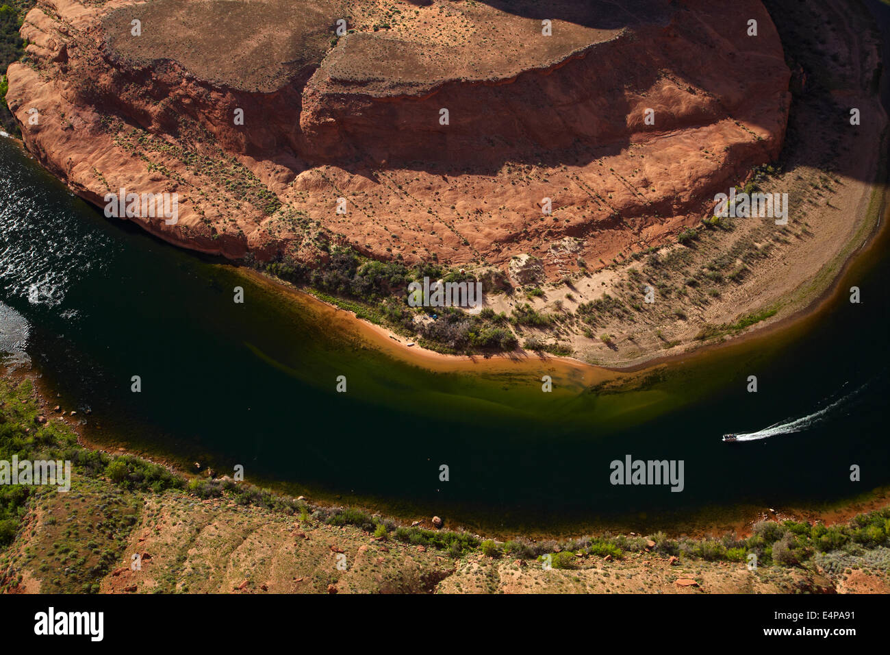 Boat on Colorado River at Horseshoe Bend, just outside Grand Canyon
