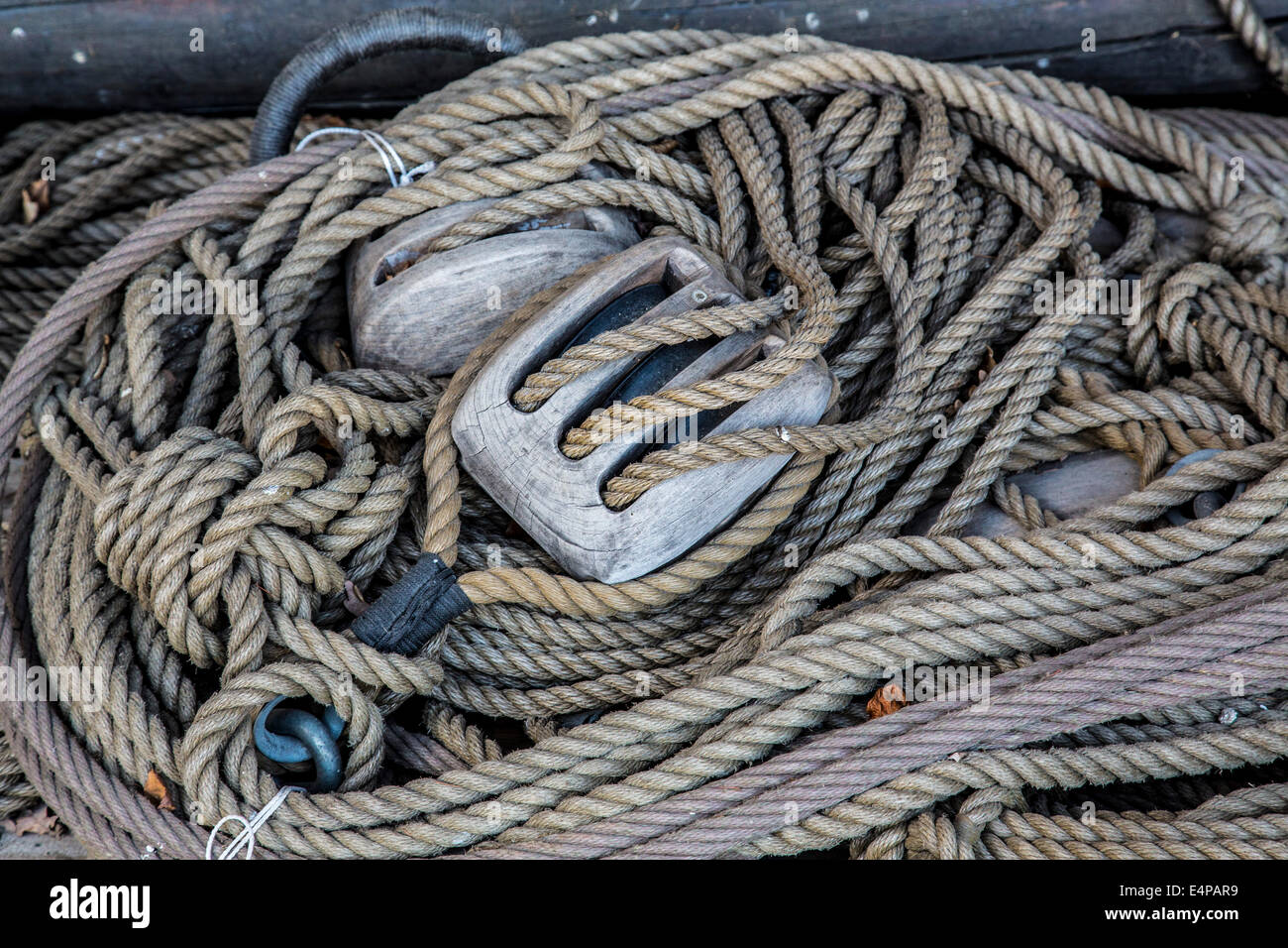 Cordage, ropes, on an old wooden sailboat, Stock Photo