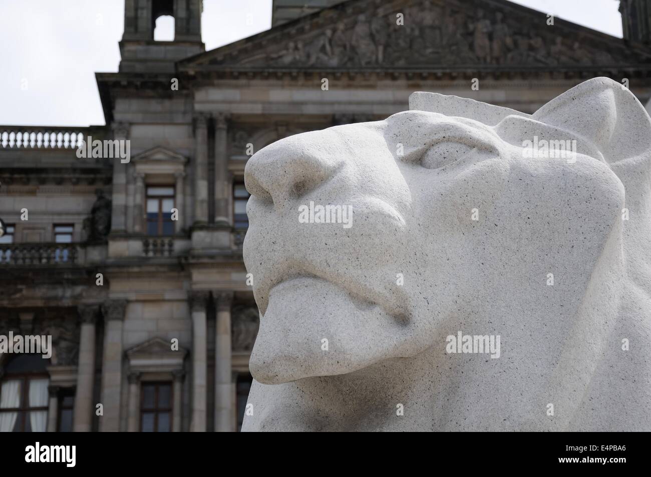 Stone lion statue outside the city chambers in Glasgow's Square