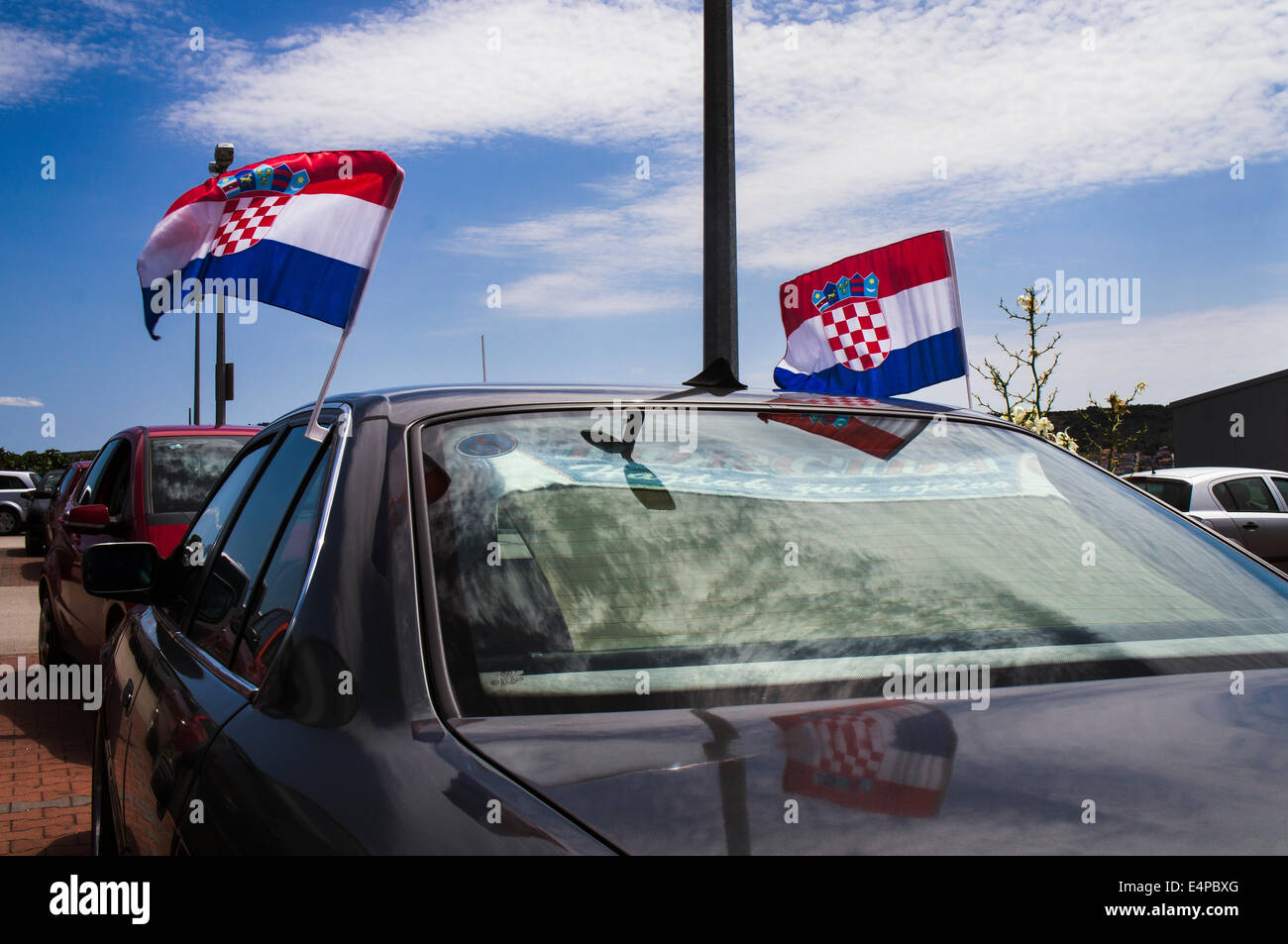 A Croatian Fan Decorate His Car With Croatian Flags Prior To
