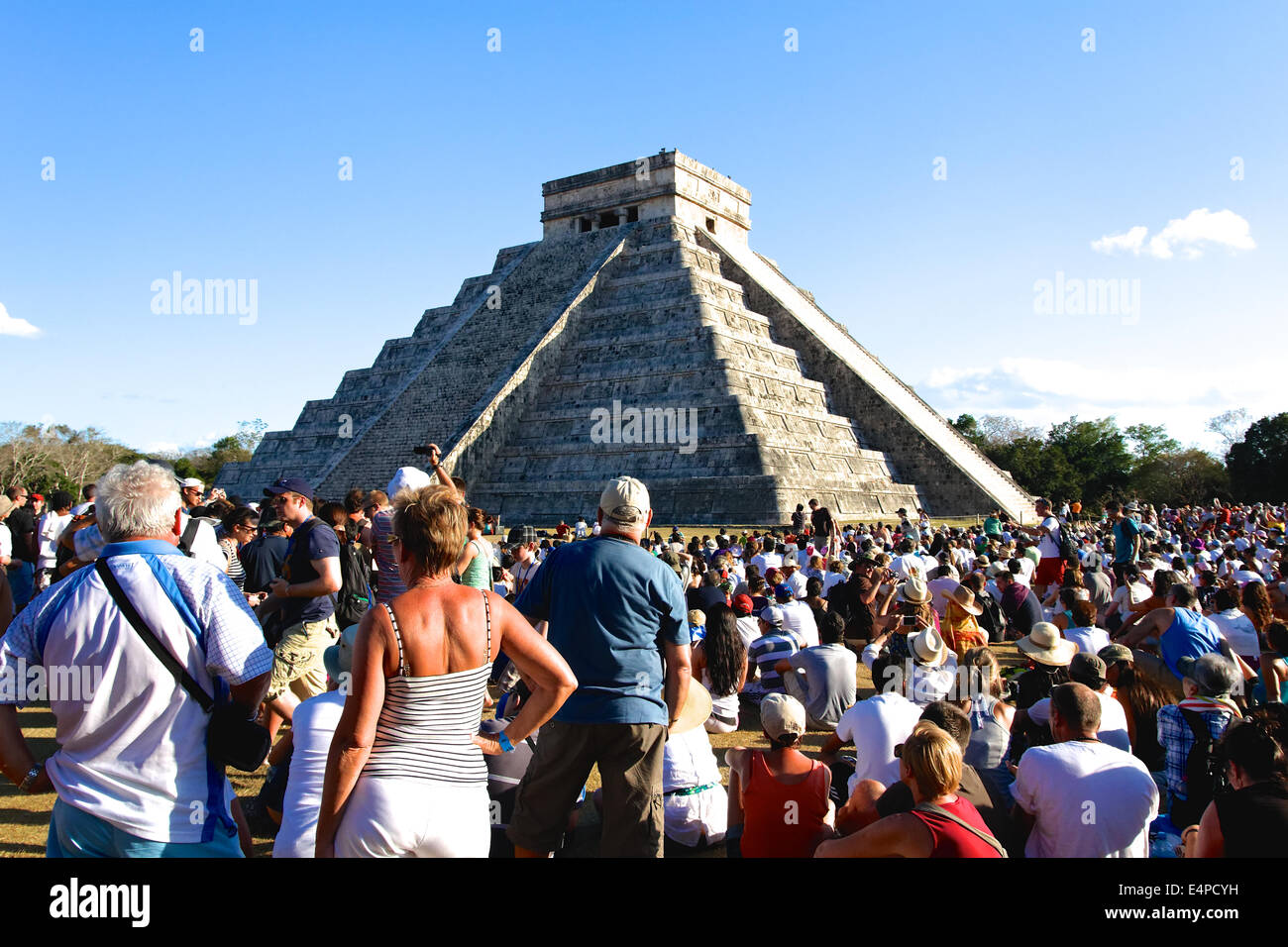 People from all over the world await the spring equinox with its famous shadowplay at the Mayan Kukulkan pyramid at Chichen Itza Stock Photo
