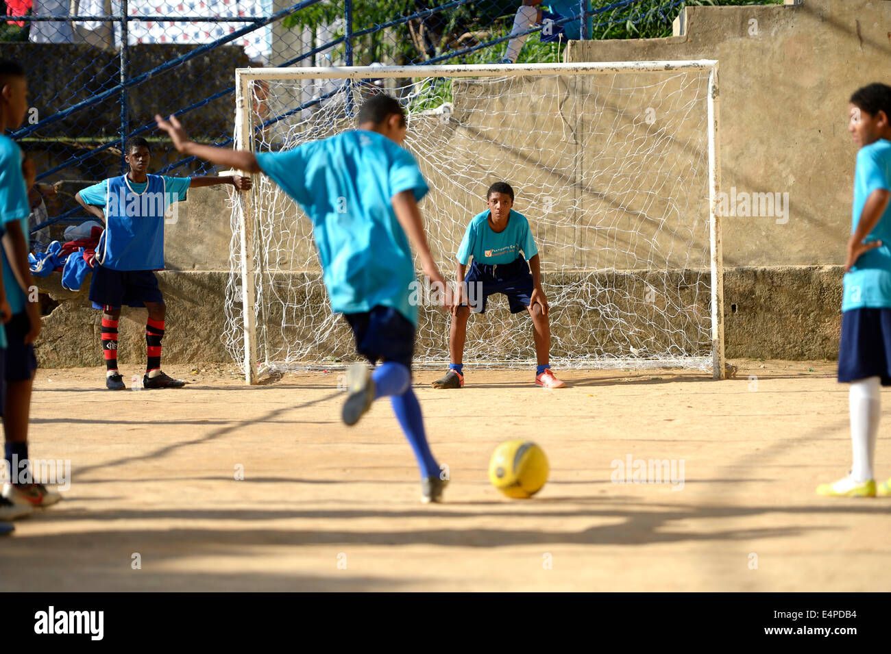 Penalty, soccer tournament on the football ground of the Guararape favela, Rio de Janeiro, Brazil Stock Photo