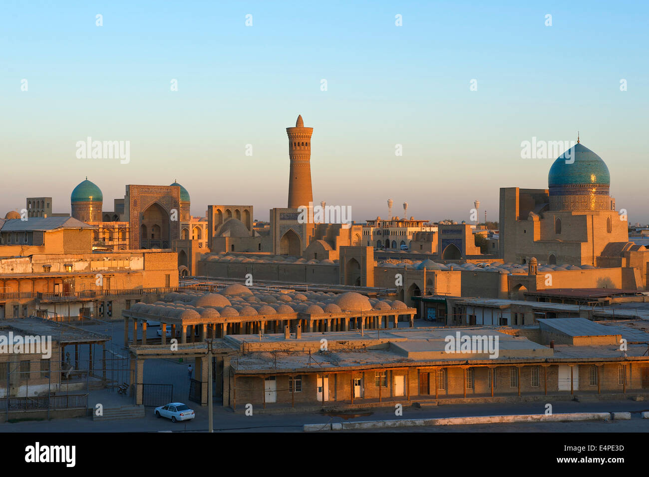 View from the Ark Fortress of the historic centre with the Mir-i-Arab Madrasah and the Kalon Mosque, Bukhara, Uzbekistan Stock Photo