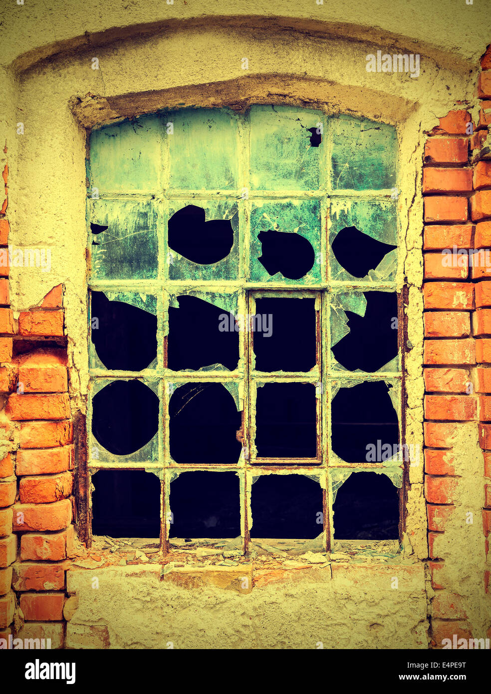 Dirty and broken glass, abandoned factory, vintage style. Stock Photo