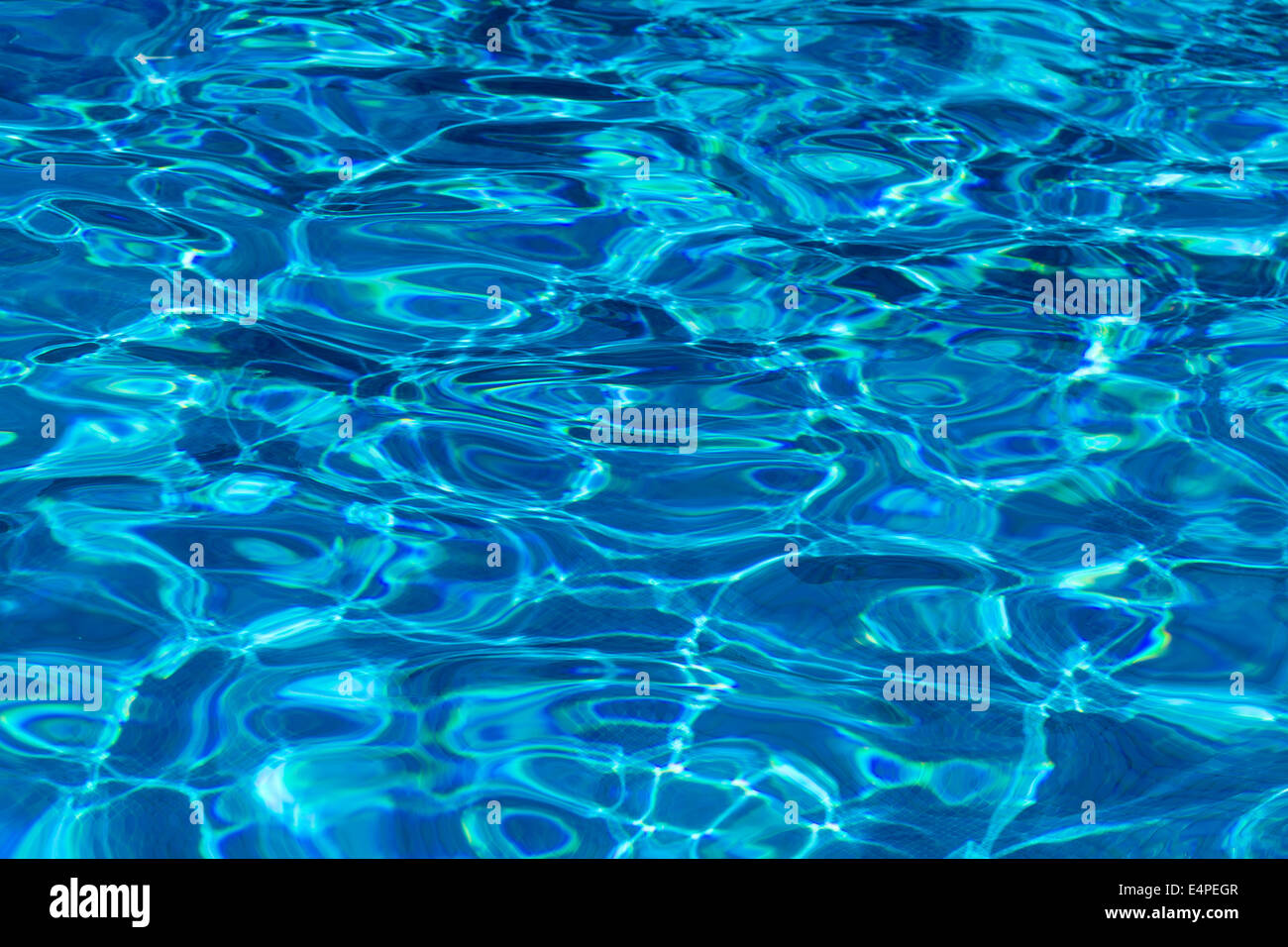 Water in a swimming pool, shimmering blue Stock Photo