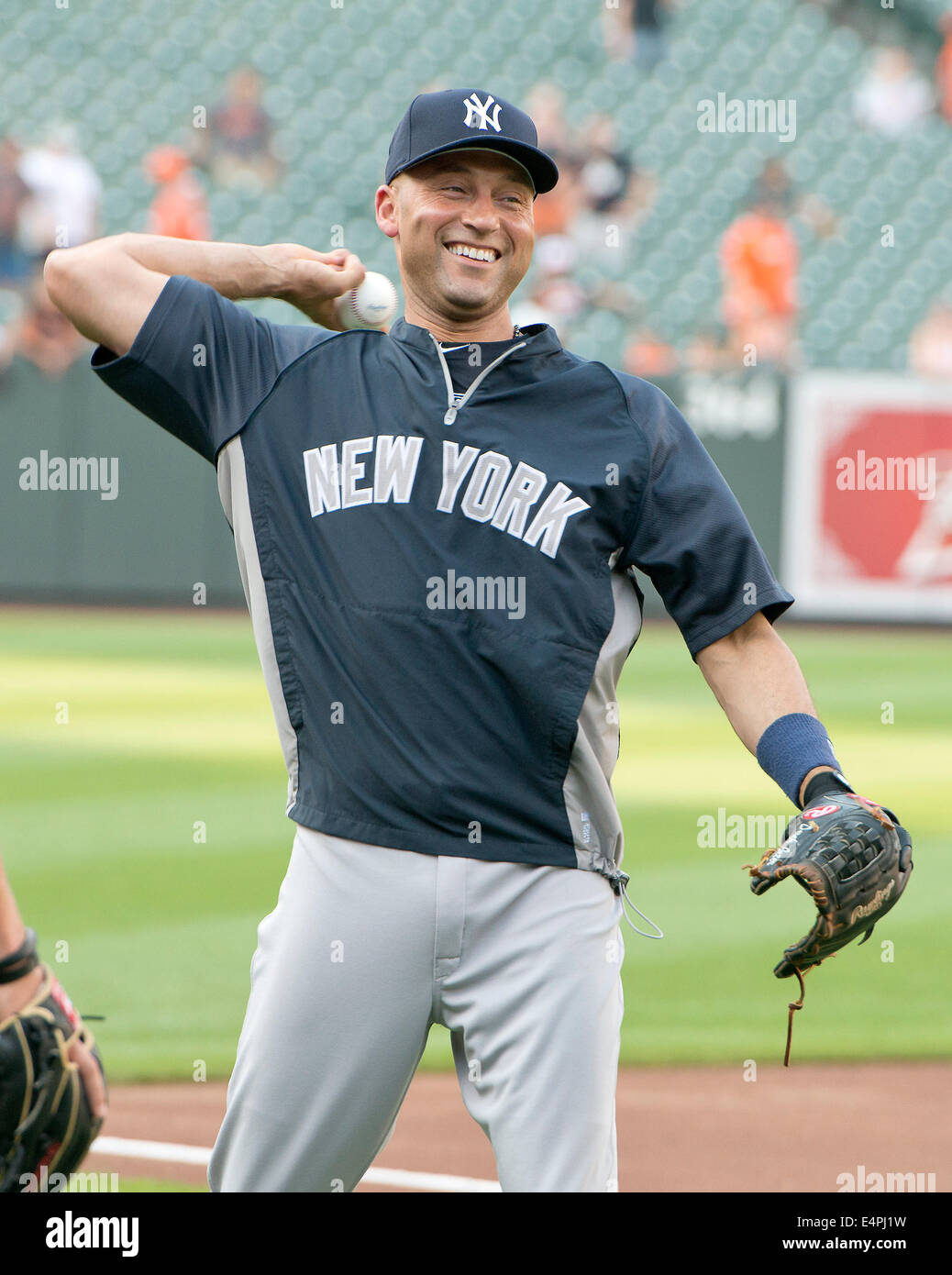 New York Yankees shortstop Derek Jeter (2) tosses the ball as he goes through his warm-up routine prior to the game against the Baltimore Orioles at Oriole Park at Camden Yards in Baltimore, MD on Sunday, July 13, 2014. The Yankees won the game 3 - 0. Credit: Ron Sachs/CNP (:. RESTRICTION: NO New York or New Jersey Newspapers or newspapers within a 75 mile radius of New York City) - NO WIRE SERVICE Stock Photo