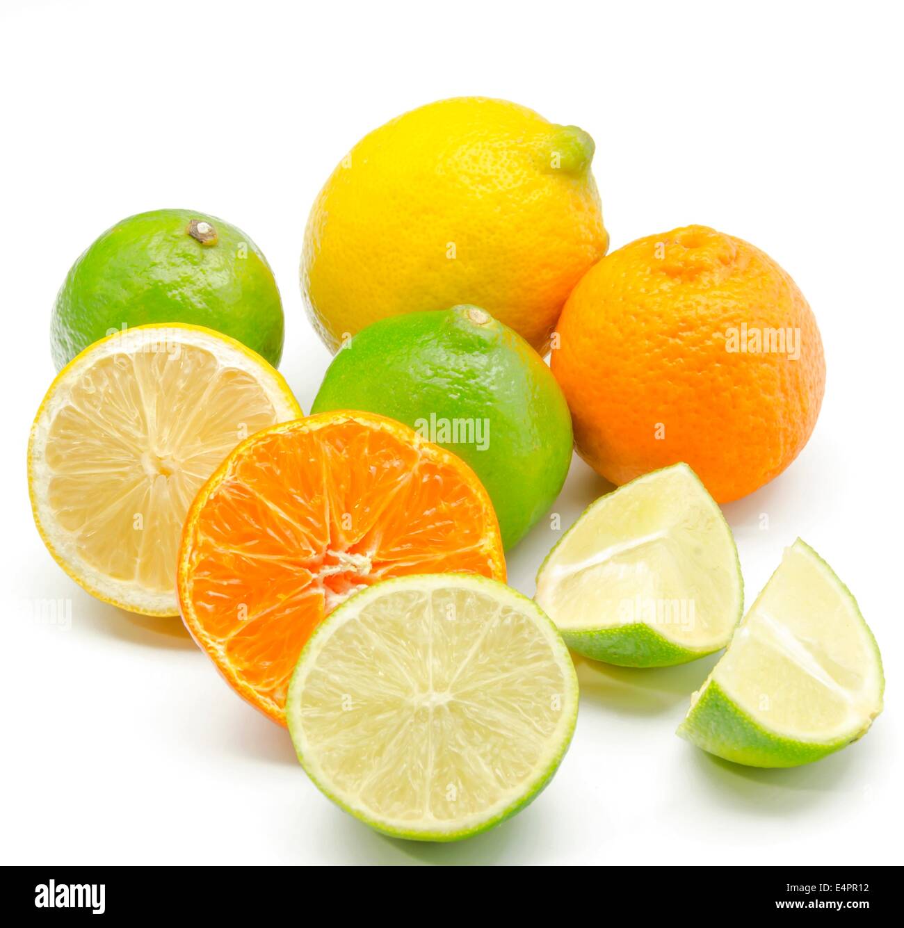 Assortment of citrus on white background Stock Photo - Alamy