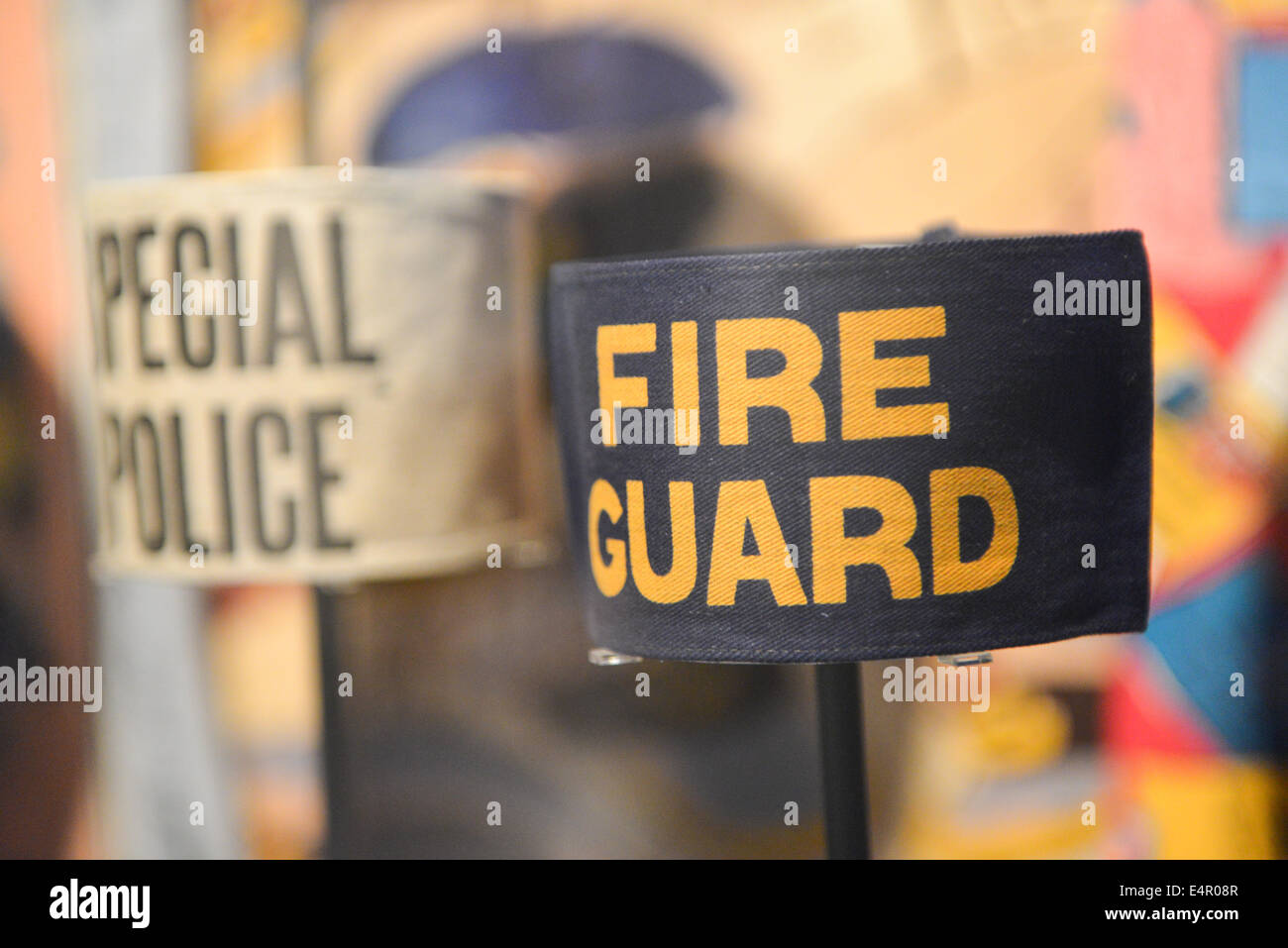 Imperial war Museum, London, UK. 16th July 2014. A variety of civil defense tin hats and armbands on display at the redeveloped Imperial War Museum. The IMW re-opens to the public on Saturday 19th July Credit:  Matthew Chattle/Alamy Live News Stock Photo