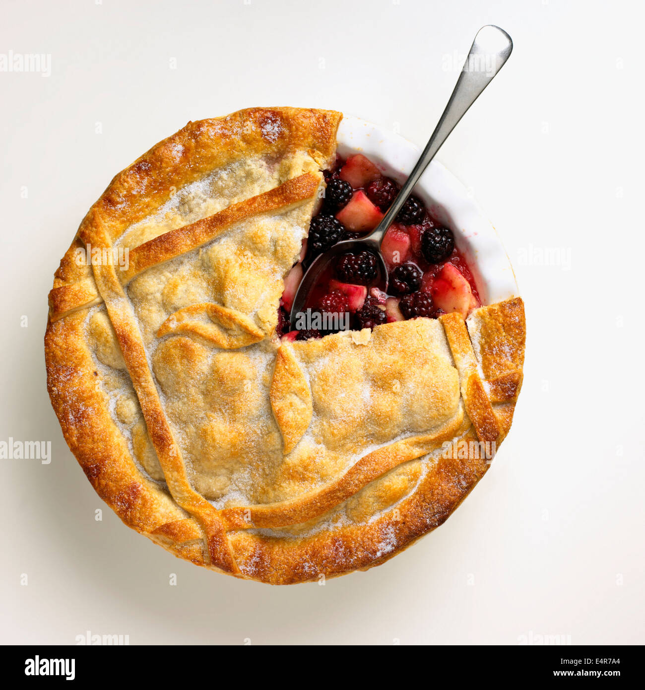 Blackberry and apple pie with part of crust removed Stock Photo