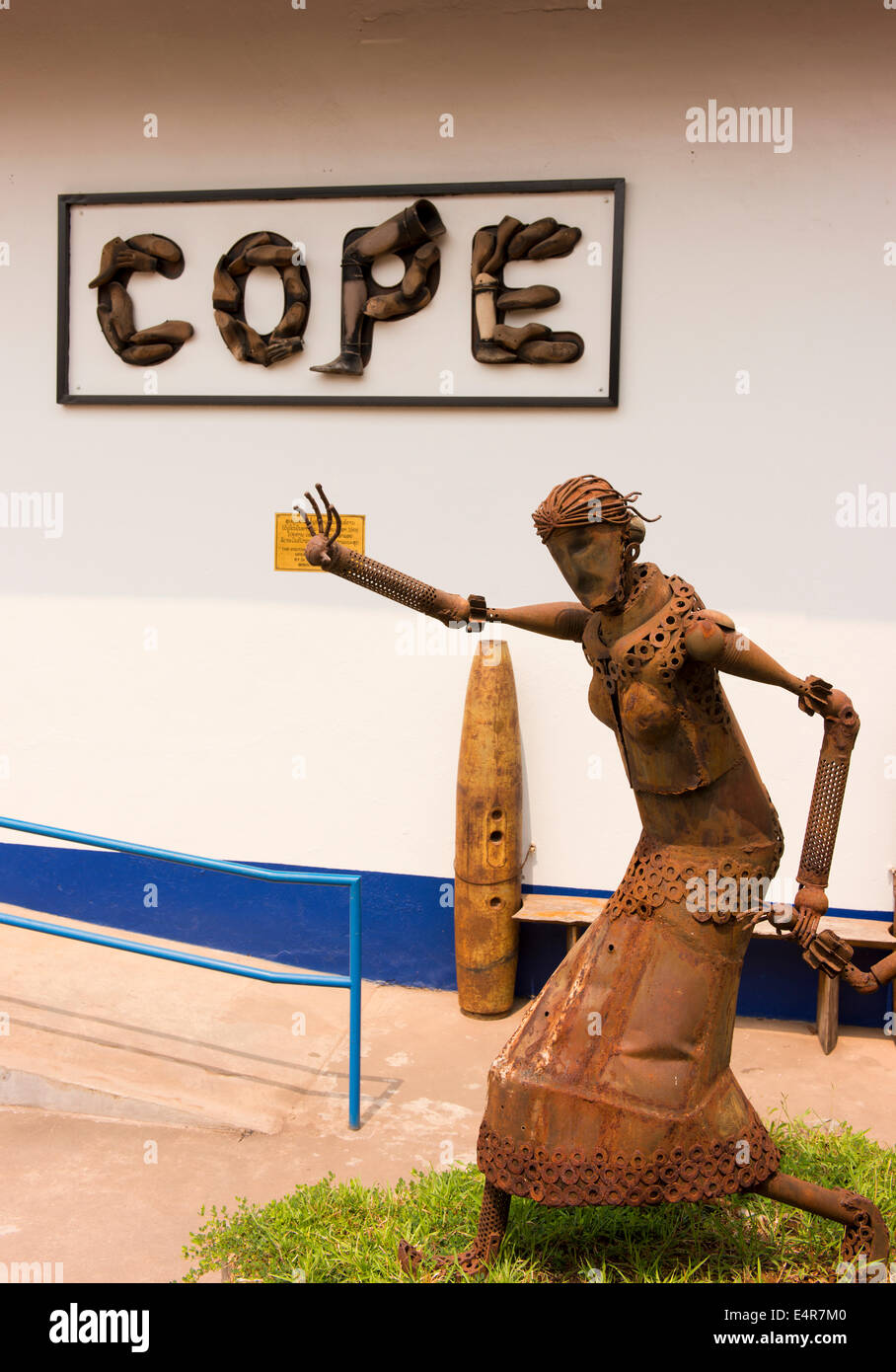 Statue made of unexploded ordnance (UXO) of a woman outside the COPE center which helps survivors of UXO. Stock Photo