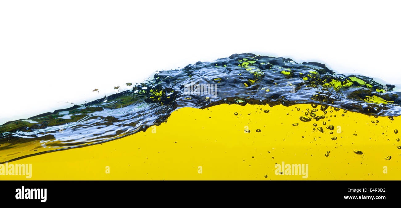 abstract image of a yellow liquid spilled. On a white background. Stock Photo