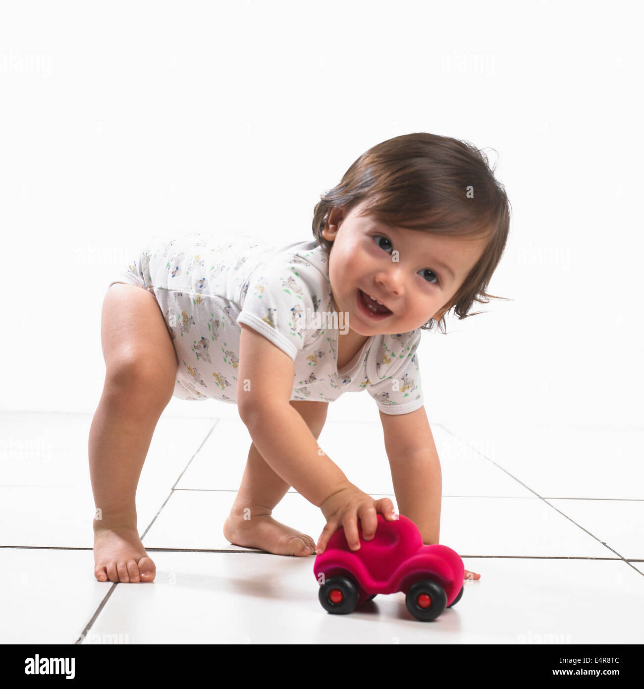 Boy pushing toy car on hi res stock photography and images Alamy