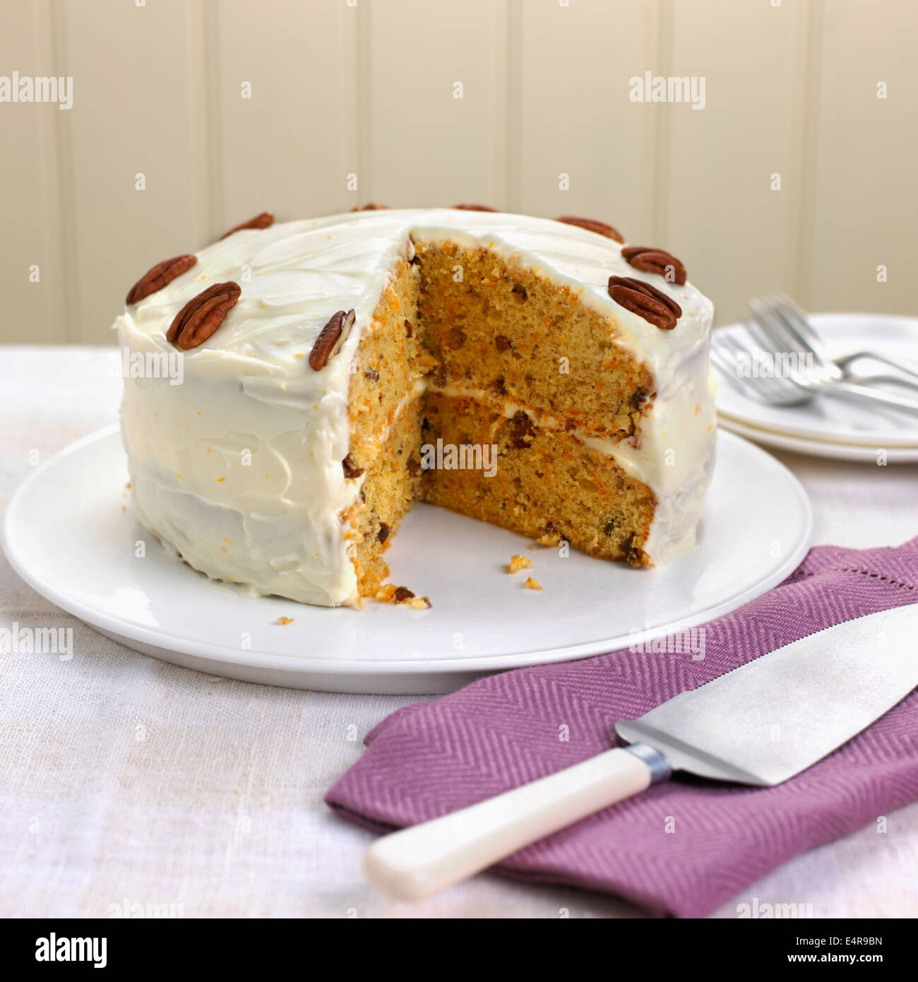 Pecan carrot cake with orange and mascarpone frosting Stock Photo