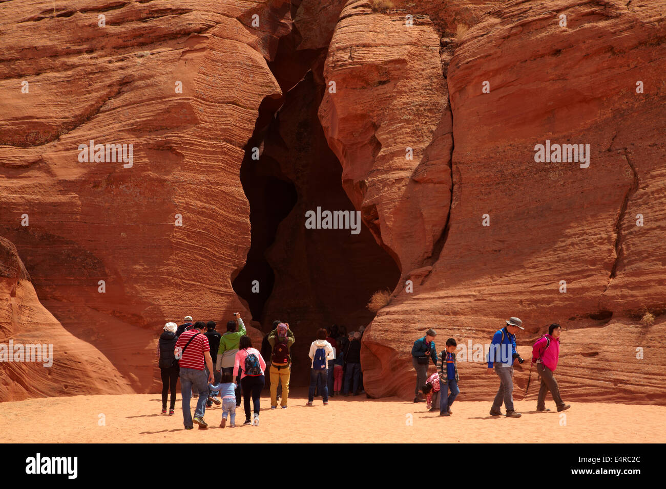 Tourists at entrance to Upper Antelope Canyon, near Page, Navajo Nation, Arizona, USA Stock Photo