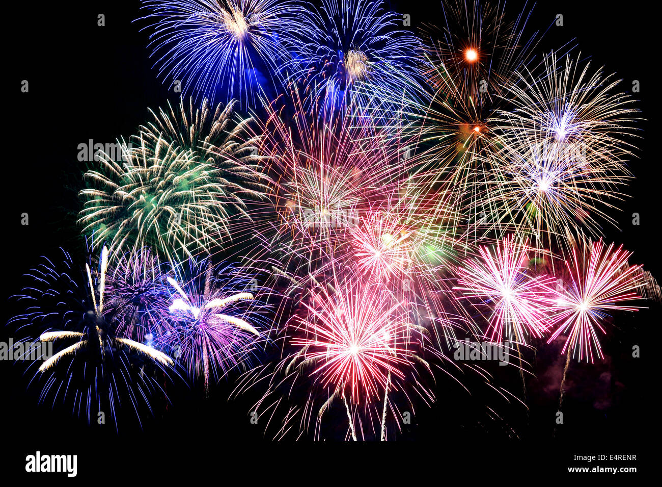 Grand finale of fireworks over dark background Stock Photo