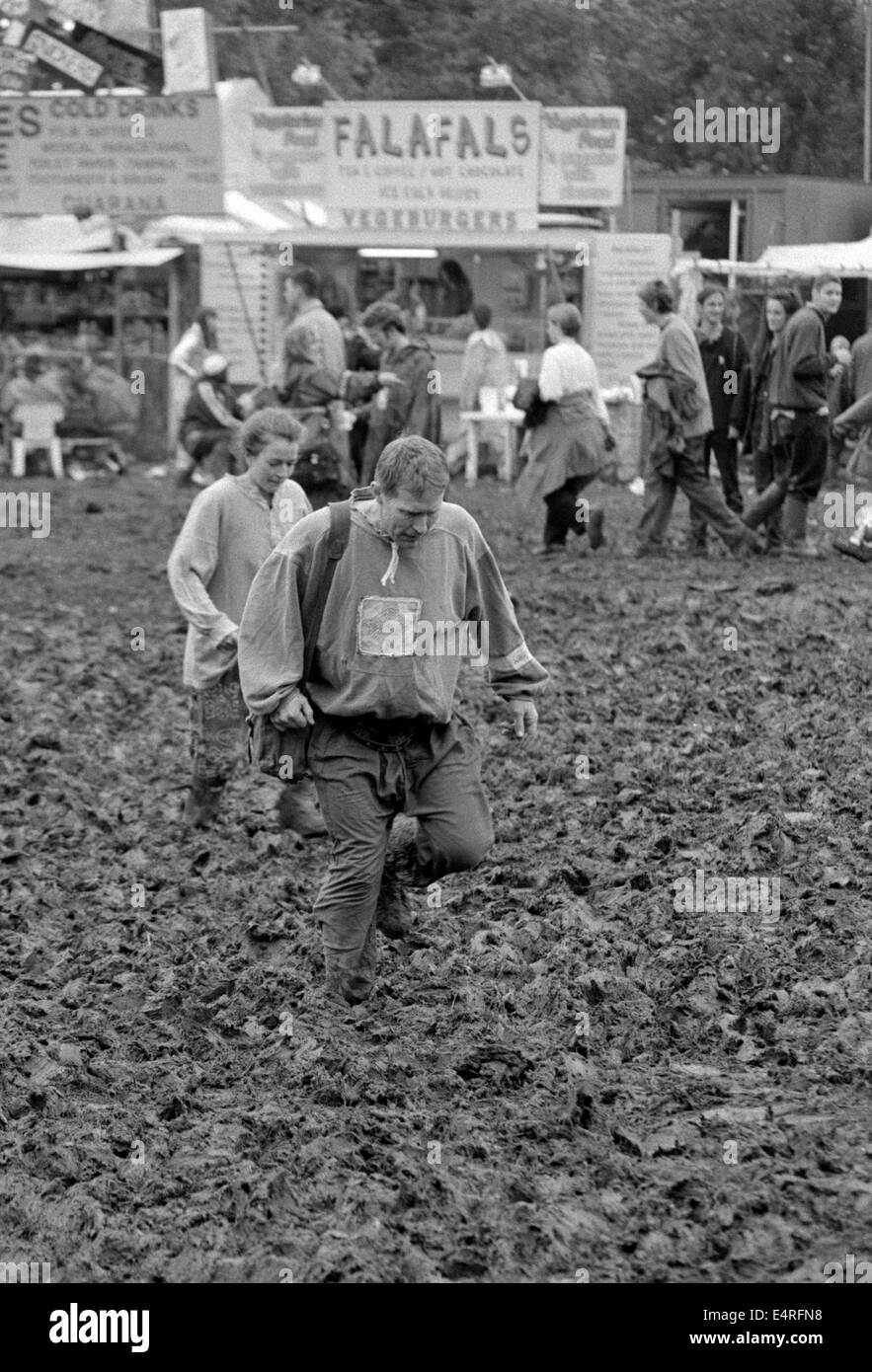 Muddy crowds at the Glastonbury Festival 1997. Stock Photo