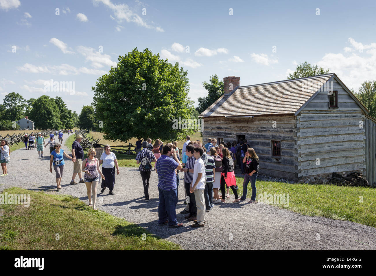 Mormon tourists visit Joseph Smith log cabin, Palmyra NY. Stock Photo