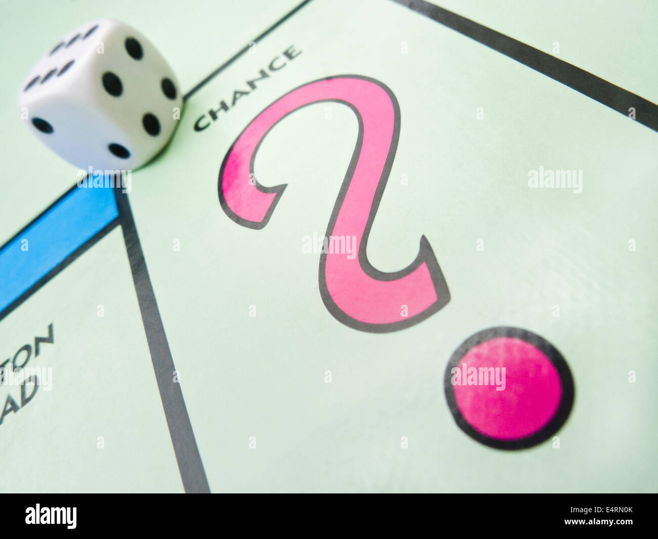 The 'CHANCE'  square on a monopoly board with a dice. Stock Photo