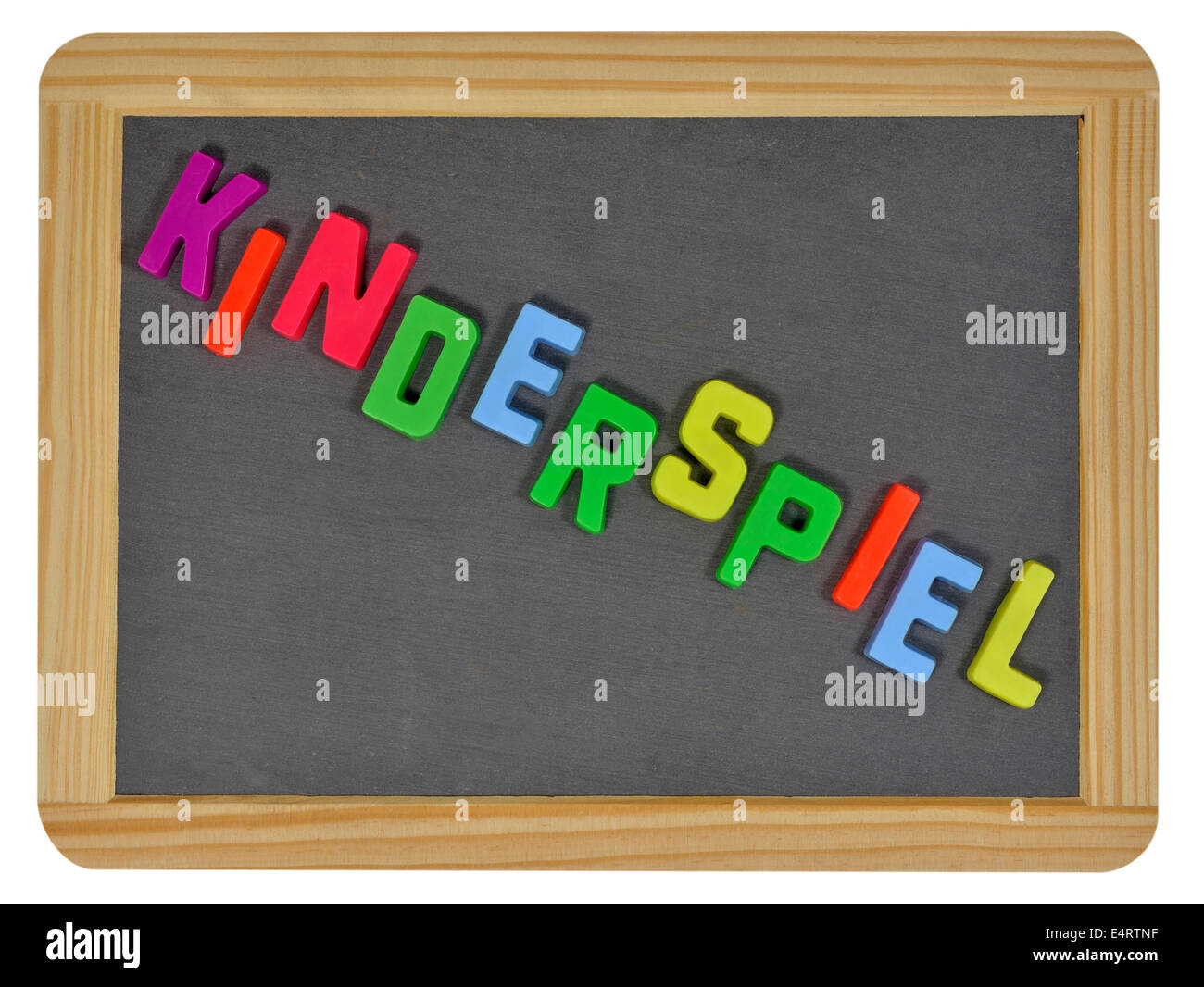Kinderspiel in colored letters written on traditional slate Stock Photo ...