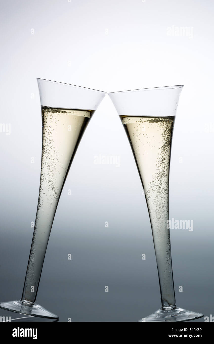 Champagnes or champagne in a champagne glass. Symbolic photo for celebrations, turns of the year and good mood, Champagner oder Stock Photo