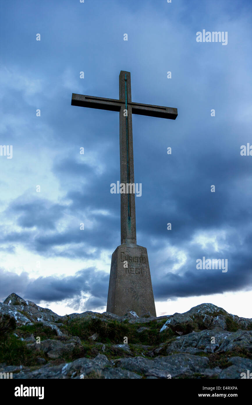 Christian cross silhouette on the top of the mountain. Bray, Ireland. Stock Photo