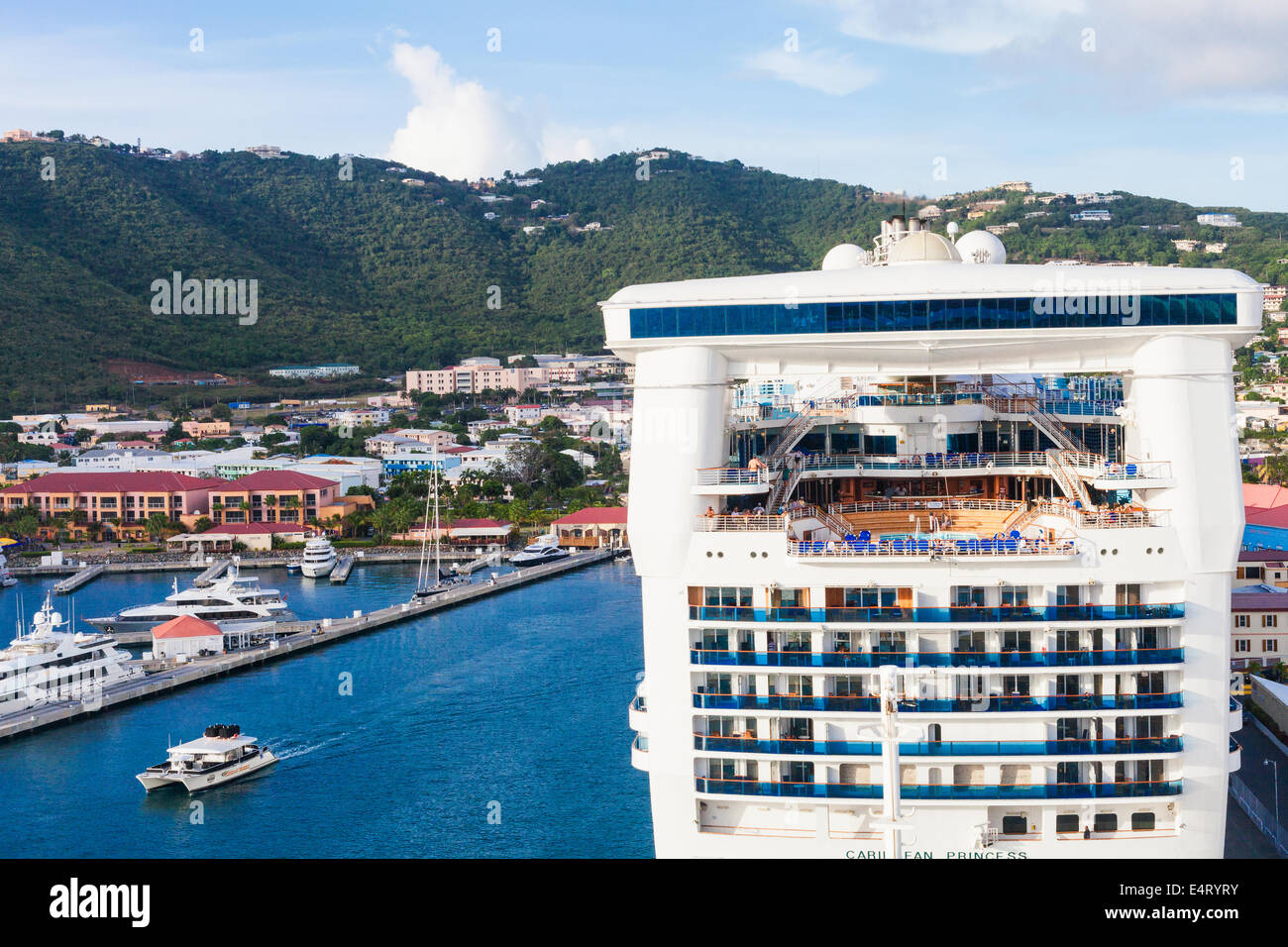 A cruise ship in port at Charlotte Amalie, St. Thomas, US Virgin Islands viewed from another cruise ship Stock Photo