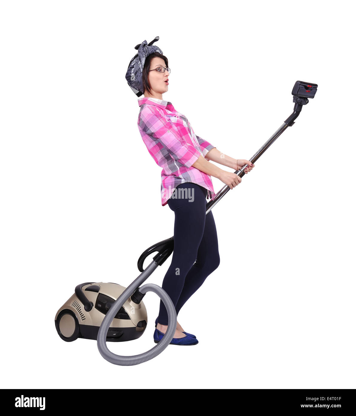 Young woman using vacuum cleaner. Isolated on white Stock Photo - Alamy