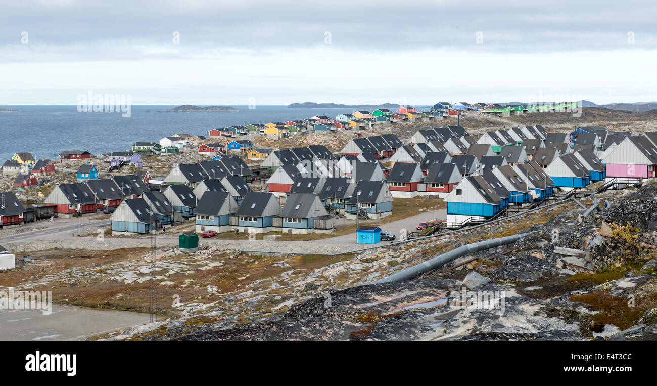 View of the city of Aasiaat in Greenland with houses and ocean Stock