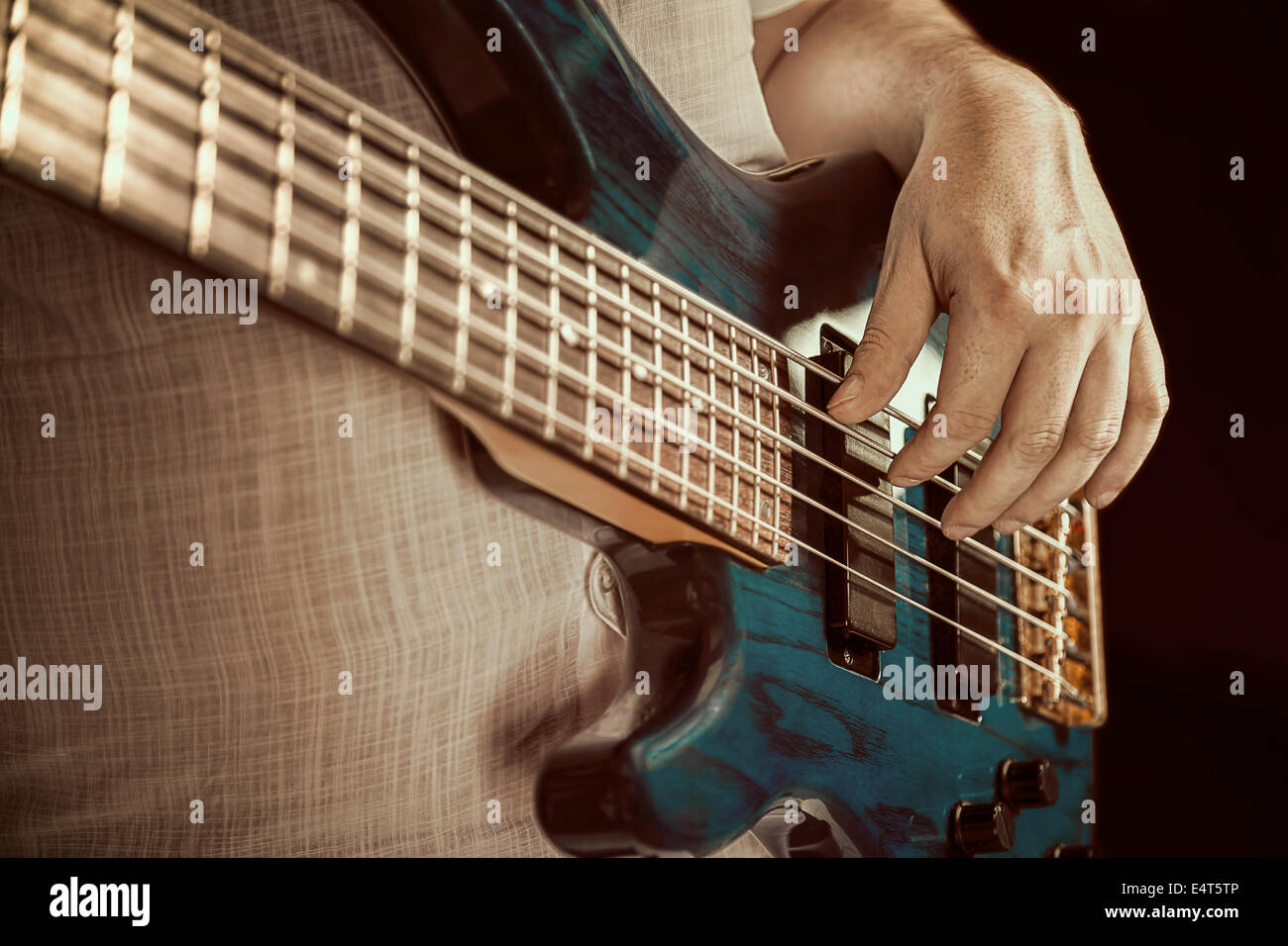 guitarist playing bas guitars, vintage image Stock Photo - Alamy