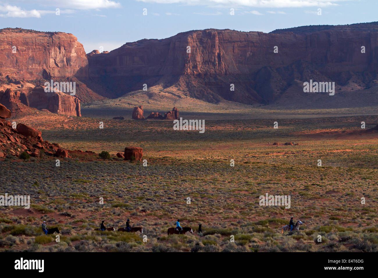 Horse riders, Monument Valley, Navajo Nation, Utah/Arizona Border, USA Stock Photo