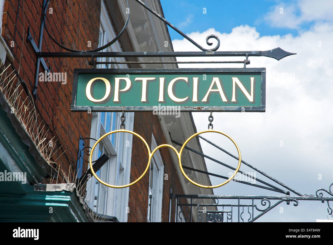 Sign for optician's shop, Farnham, Hampshire, England UK Stock Photo