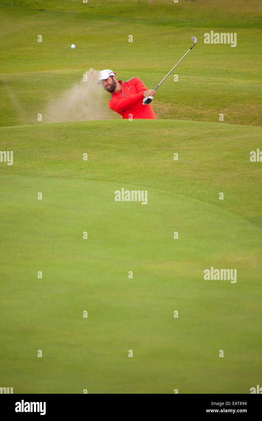 Hoylake, UK. 16th July, 2014. The Open Golf Championship. Paul Casey taking bunker shot on 16th hole Stock Photo