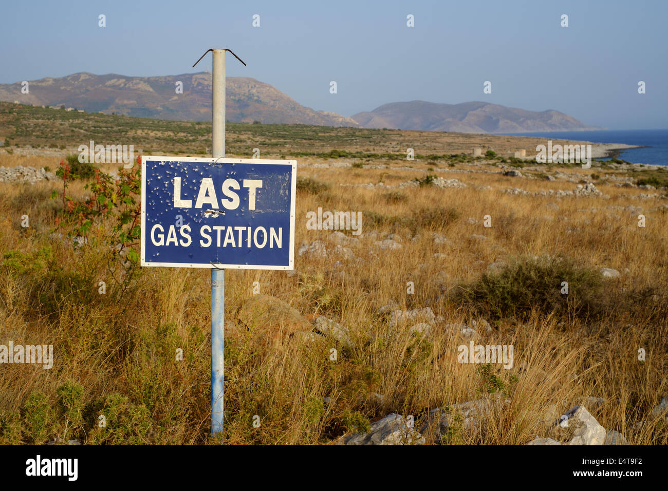 MANI PENINSULA, PELOPONNESE, GREECE, 8th July 2014. Last Gas Station - road sign in the southerly and remote Deep Mani. Stock Photo