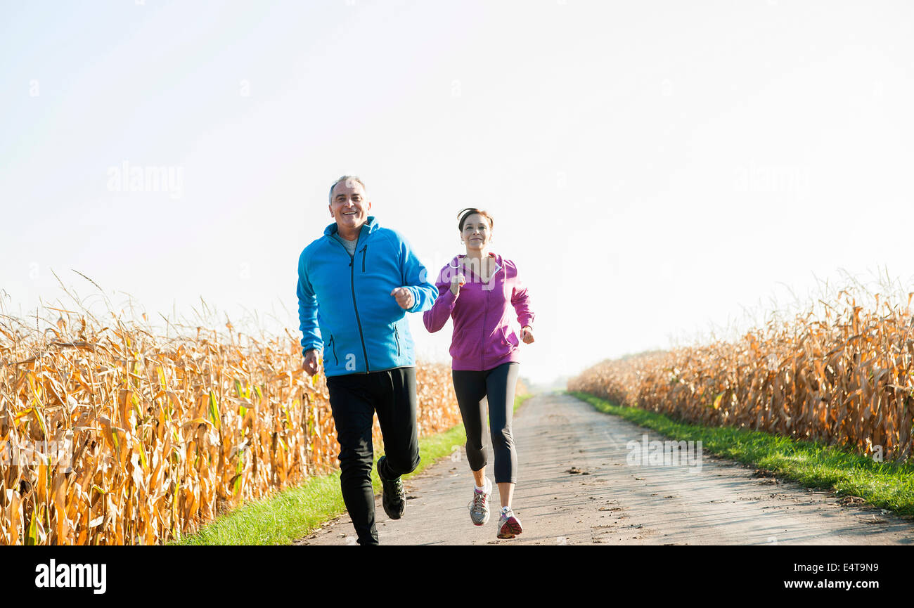 Couple Jogging Outdoors, Baden-Wurttemberg, Germany Stock Photo