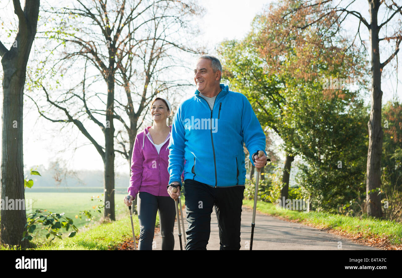Couple Nordic Walking Outdoors, Mannheim, Baden-Wurttemberg, Germany Stock Photo
