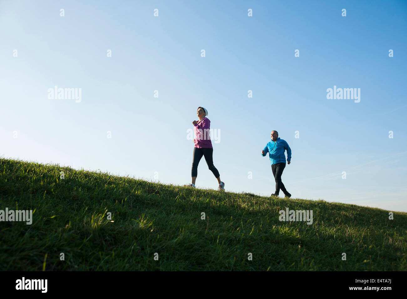 Couple Jogging Outdoors, Mannheim, Baden-Wurttemberg, Germany Stock Photo